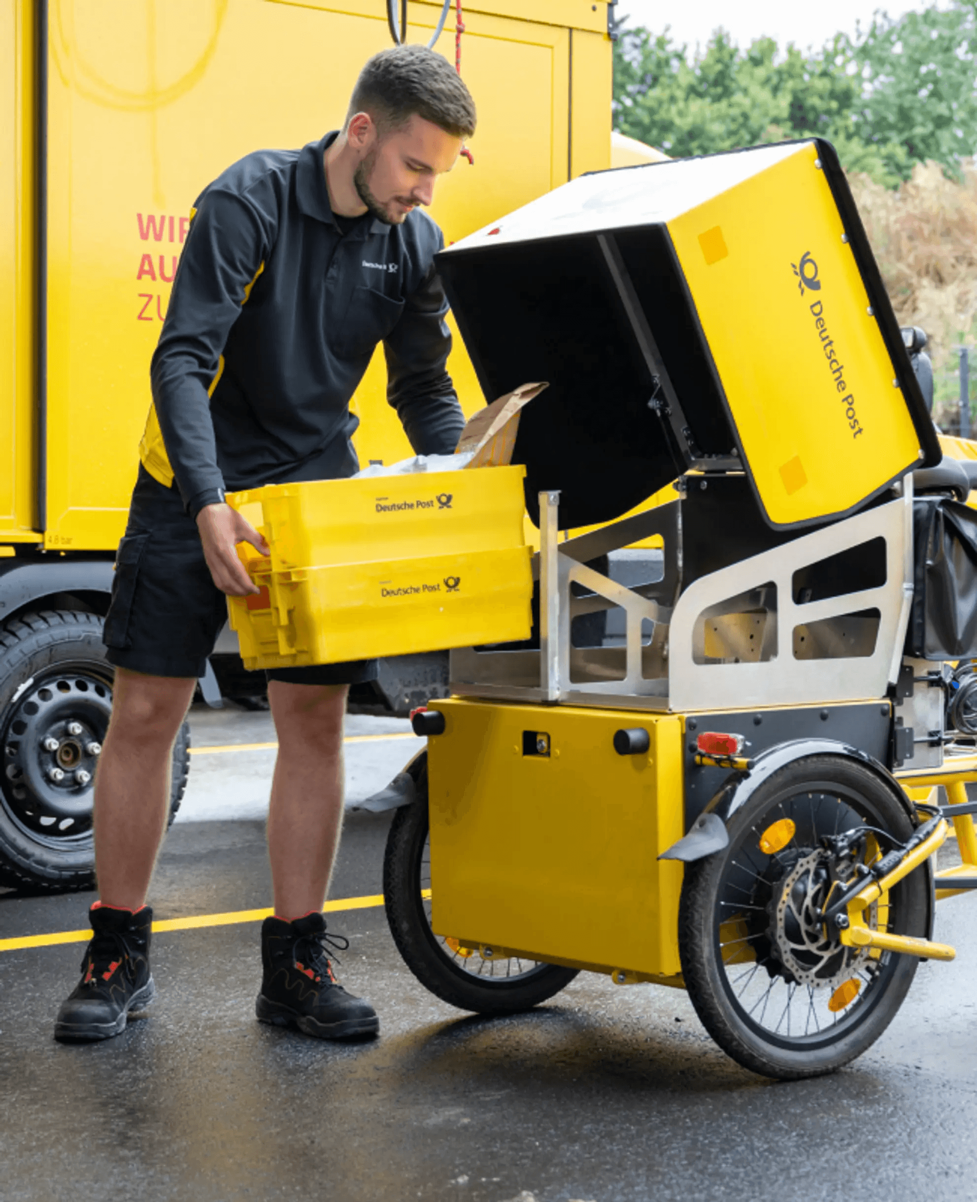 Image of someone working with a delivery bike.